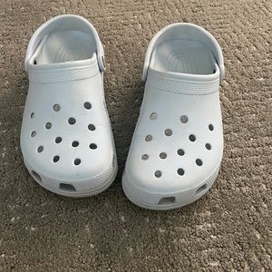 Light blue crocs.